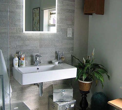 bathroom sink and tiles. 