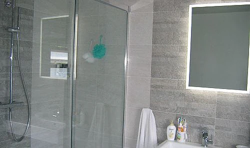 bathroom tiles with mirror and shower