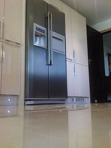 tiled floor and fridge